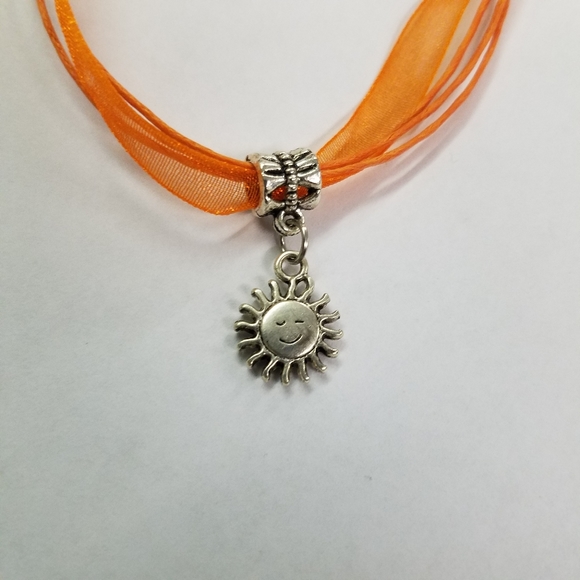 Nwot silvet Sun on an Orange Ribbon Necklace - Picture 1 of 5